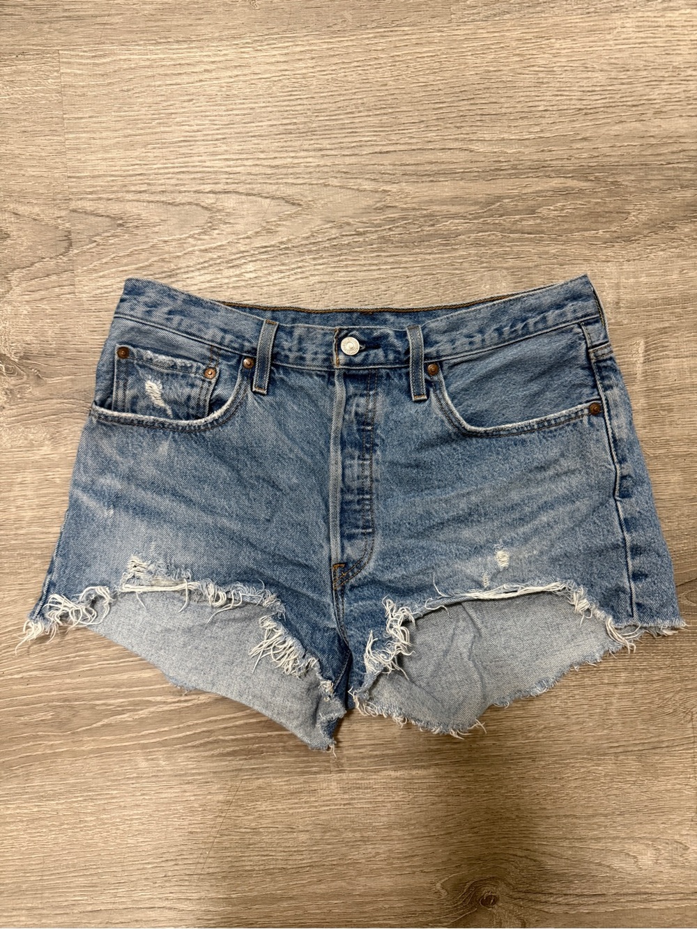 Levi's Medium Blue Distressed Denim Cutoff Shorts